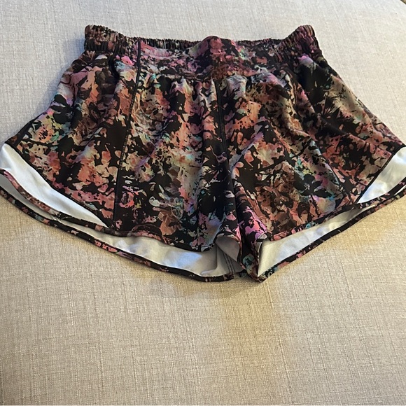 lululemon athletica Pants - lululemon athletica Black and Pink Floral Athletic Shorts - Preloved